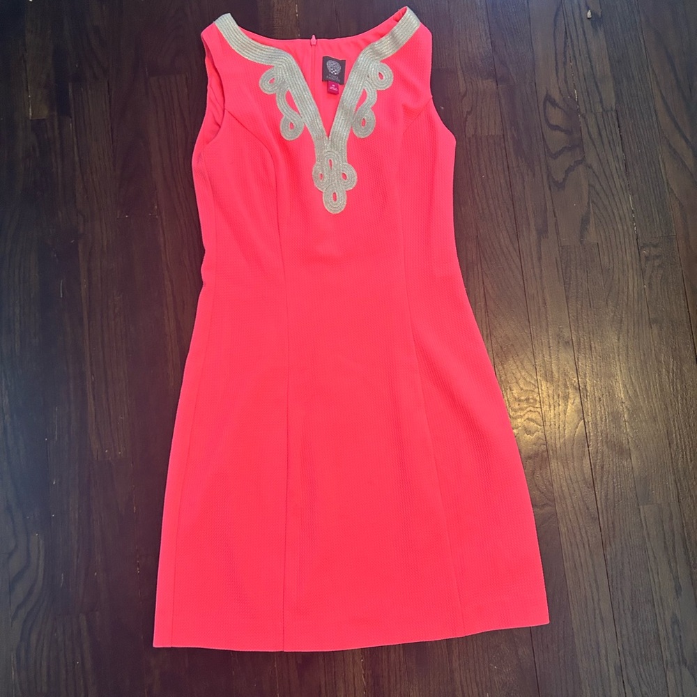 Elegant Coral Dress with Gold Accents